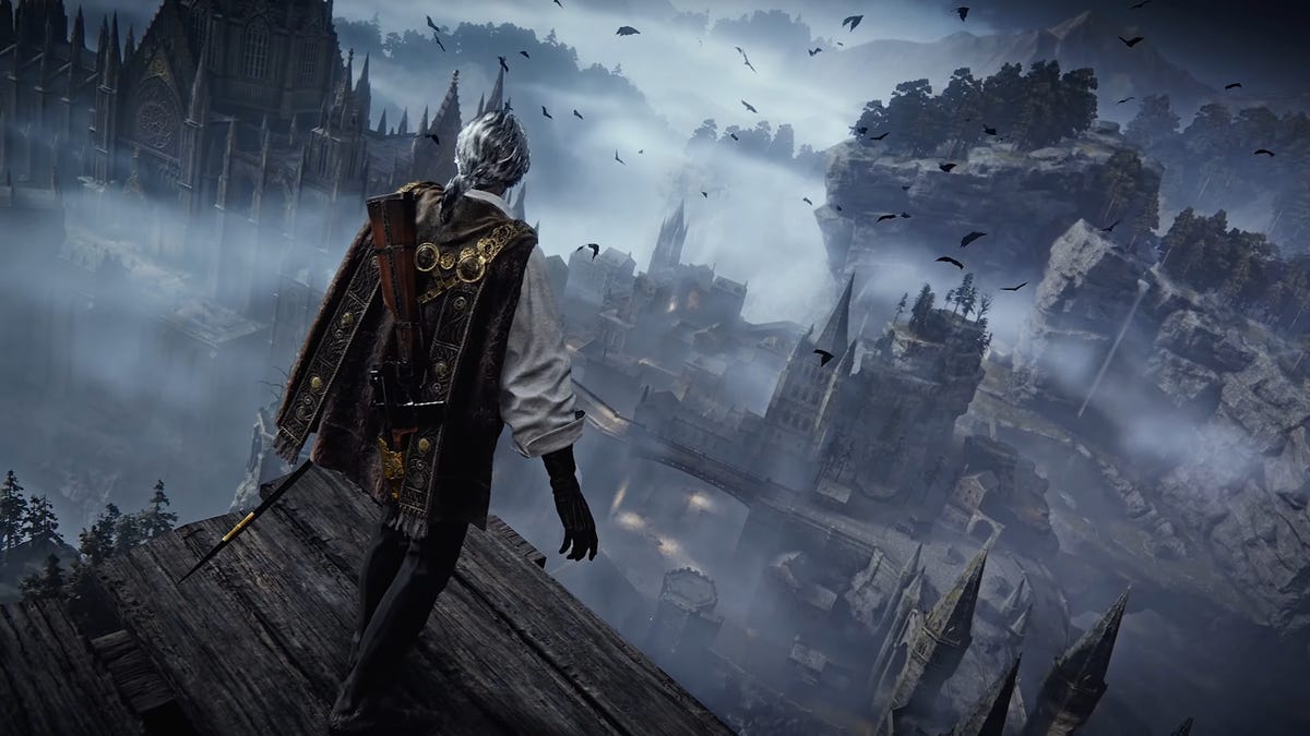 screenshot from The Duskbloods trailer; a man with a cape and rapier is seen from behind looking down on a gothic castle
