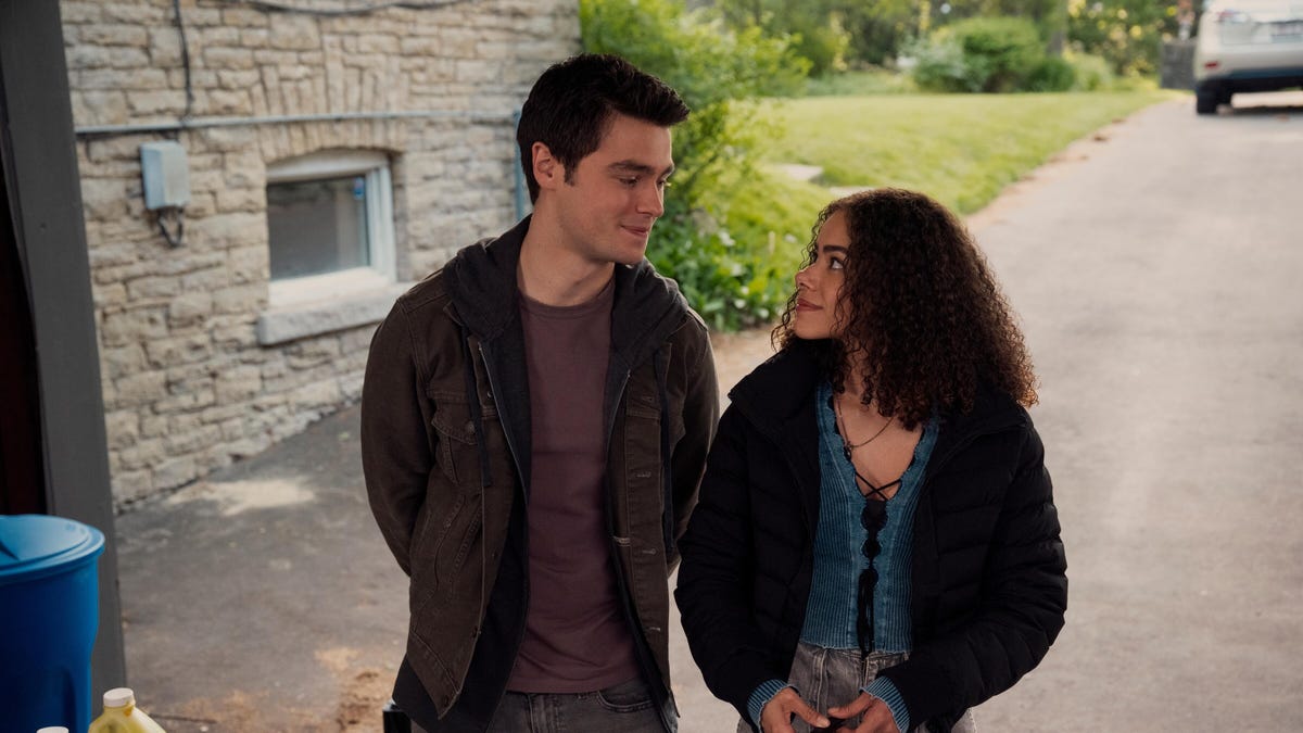 ginny walks with a boy in Ginny and Georgia