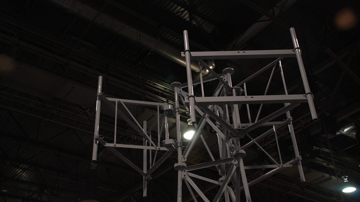 Cell tower pictured at night.