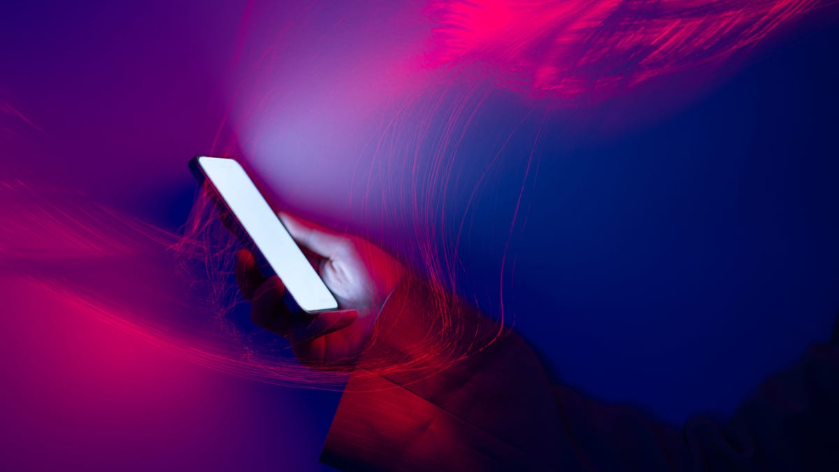 Abstract picture of colorful light trails crossing the sky with fast motion.