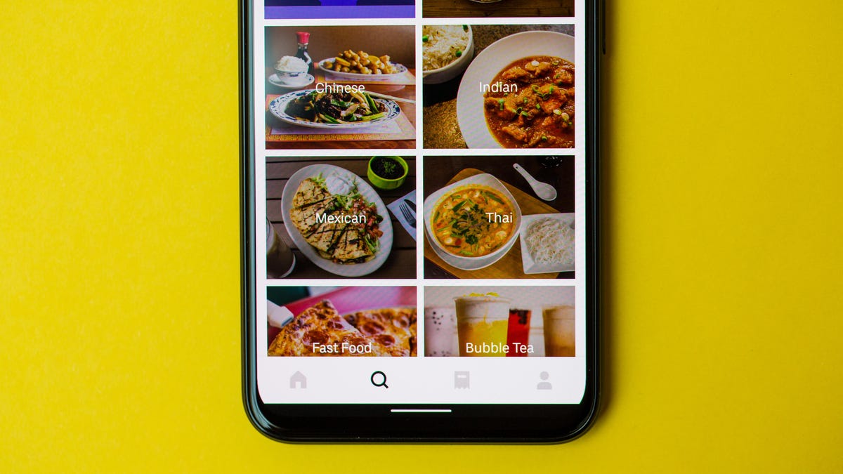 A phone showing the Uber Eats app