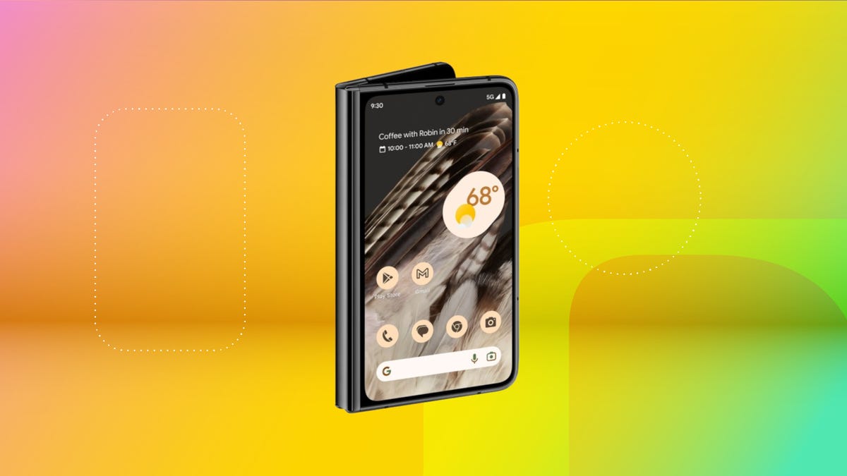 Google Pixel Fold phone in front of blue background