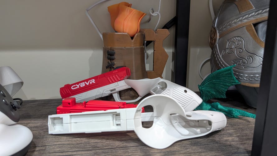 A set of red and white grips that look like hand guns