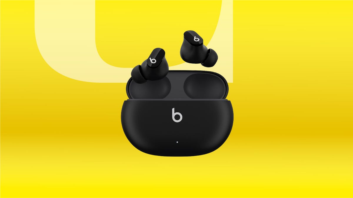 Black Beats Studio Buds on a yellow background