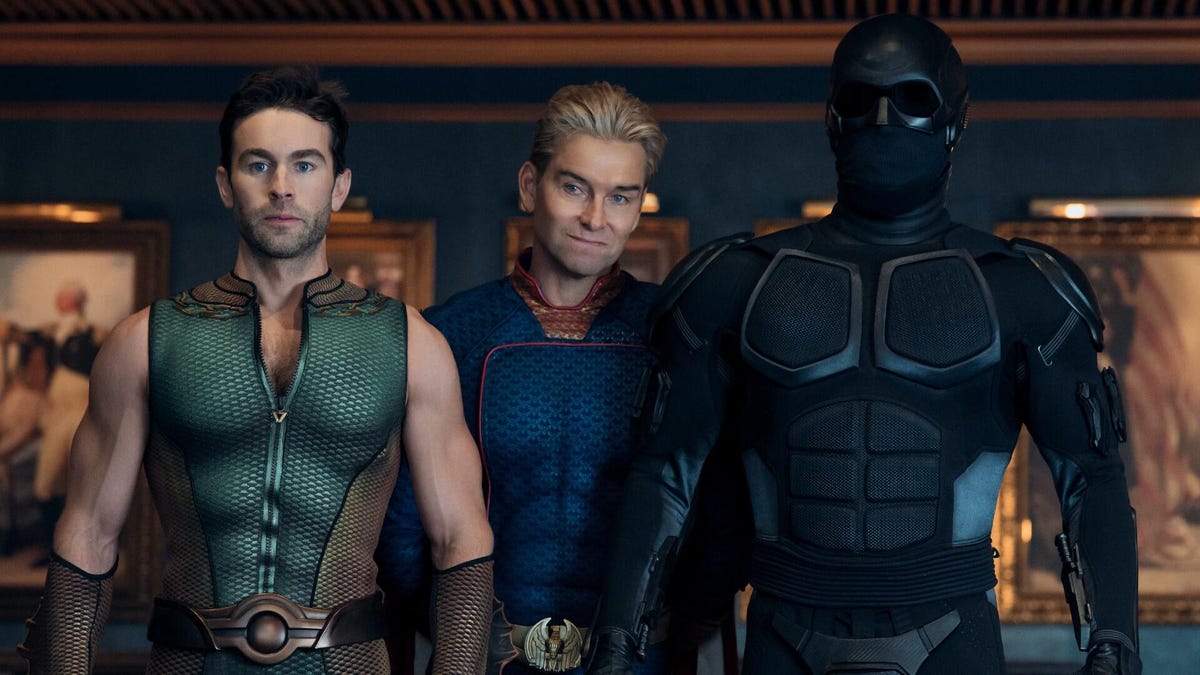 Production still from The Boys showing three men in superhero costumes.
