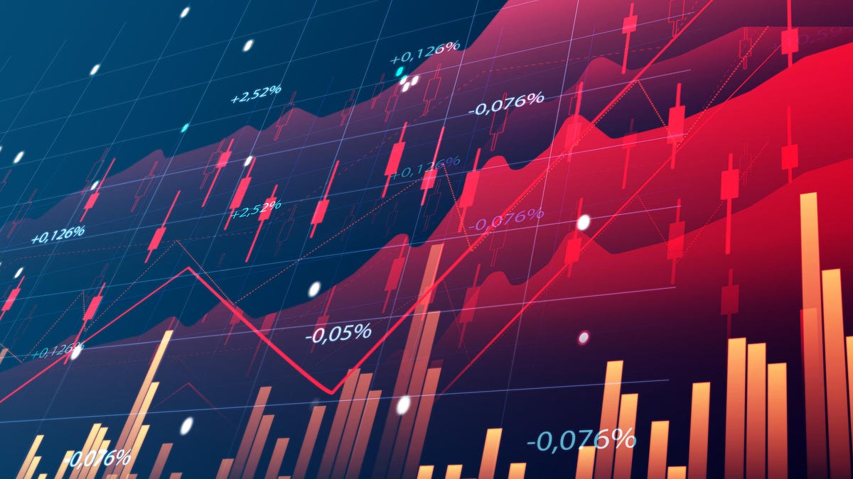 background of $100 bill with stock market arrows pointing downward