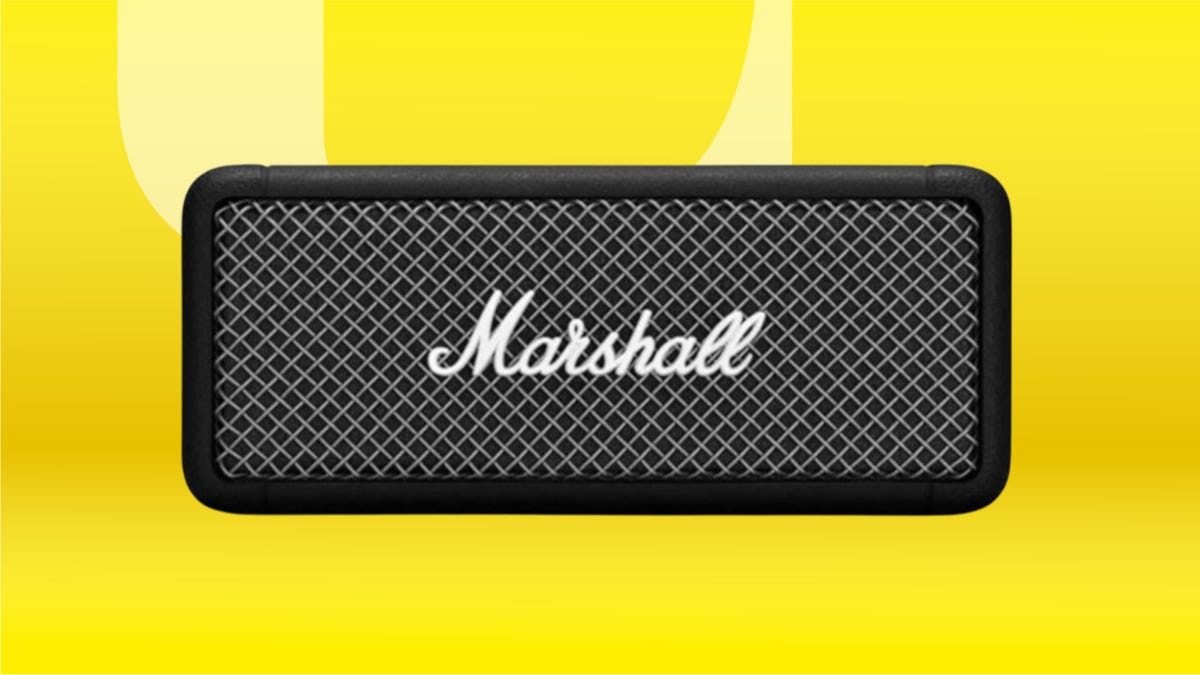 Black rectangular Marshall speaker against yellow background