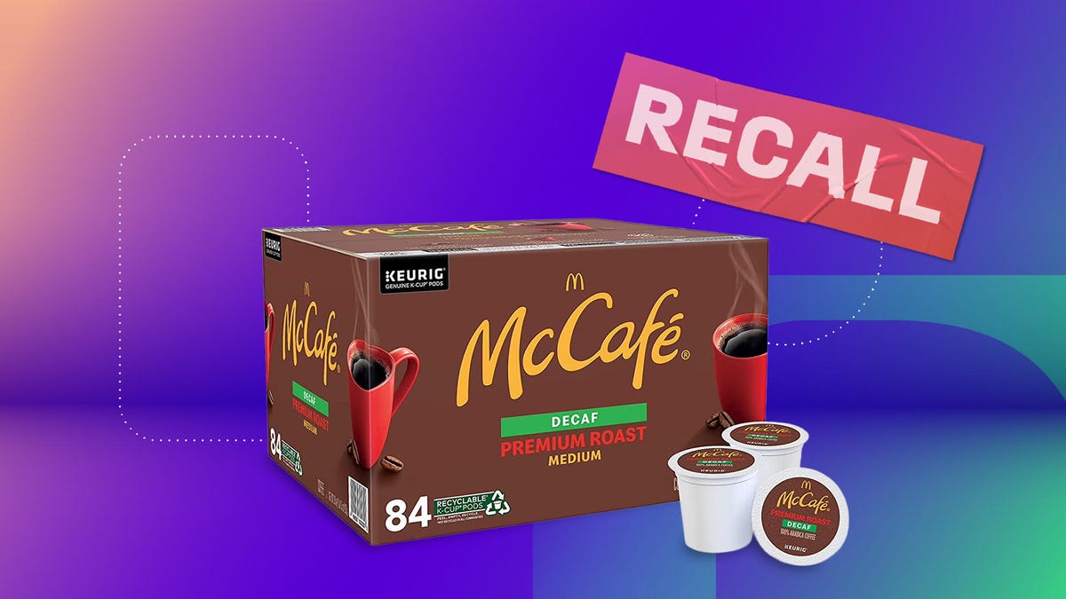 A box of McCafe Premium Roast Decaf Keurig pods with a purple and blue background