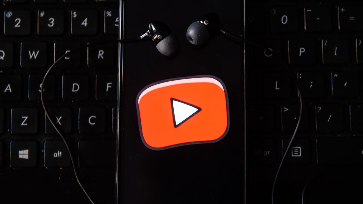 In this photo illustration the Youtube logo seen displayed