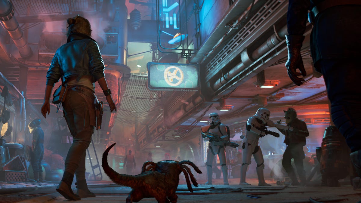 A woman walks in a dim, seedy area with her small alien companion beside her.