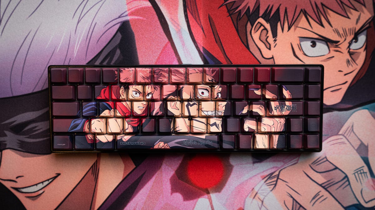 Higround's 65% gaming keyboard with Jujutsu Kaisen anime print on the keycaps and sitting on a matching deskpad
