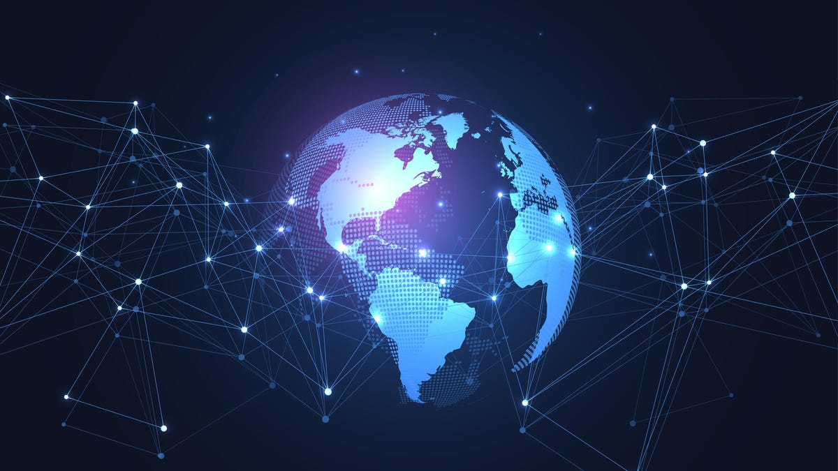 An image of the globe surrounded by lines of light