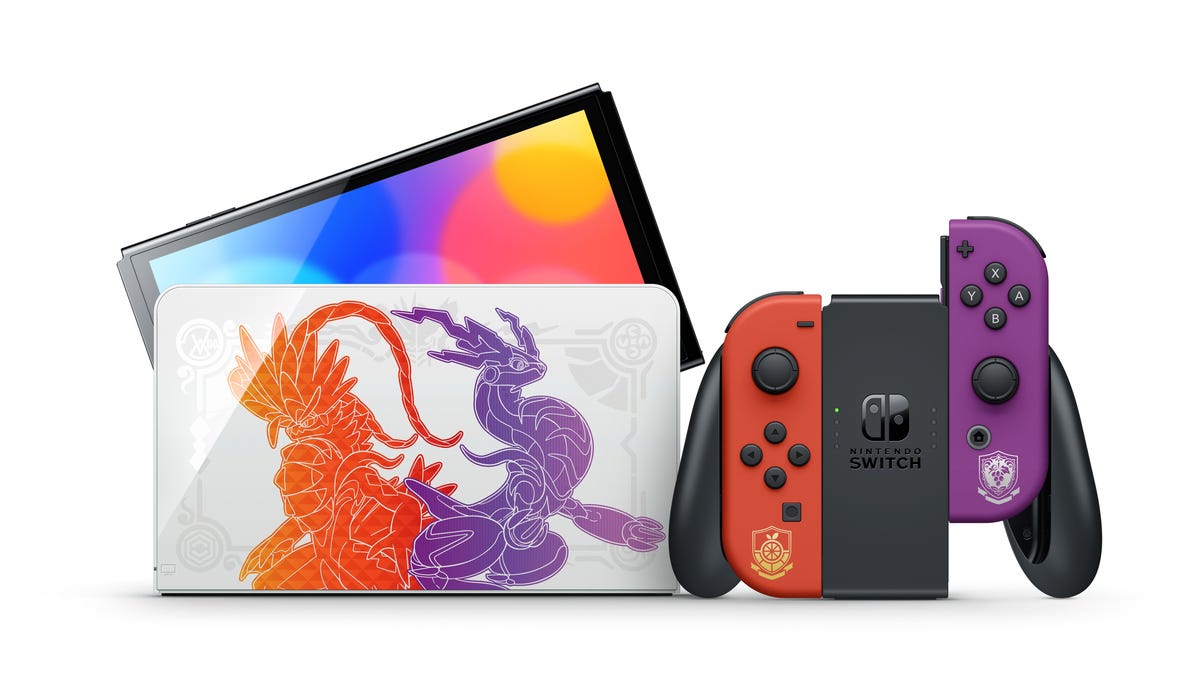 A Nintendo Switch OLED model Pokemon Scarlet and Violet Edition dock, console and Joy-Cons