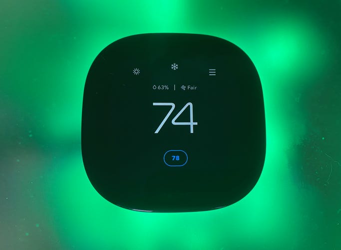 Ecobee Smart Thermostat Premium on a green background