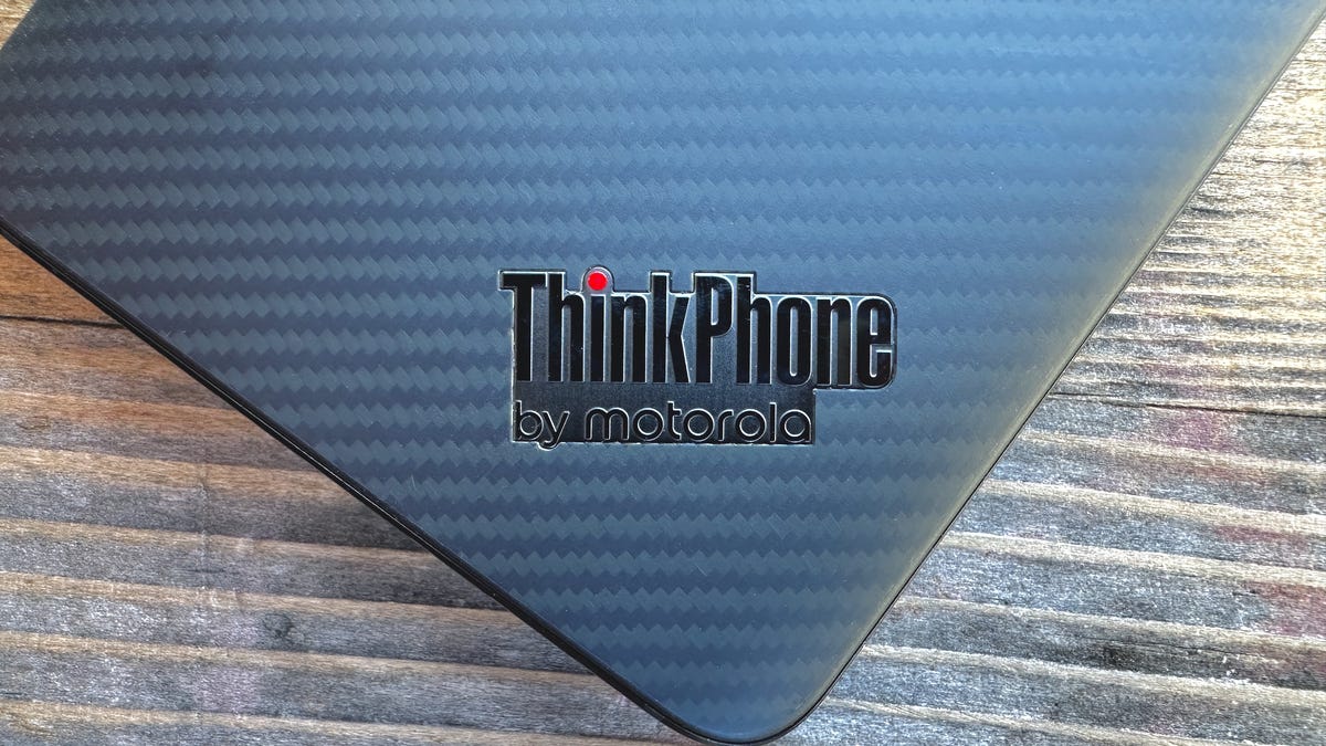 ThinkPhone by Motorola on an orange background
