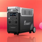 The Fossibot F3600Pro portable power station is displayed against a gradient orange and red background.