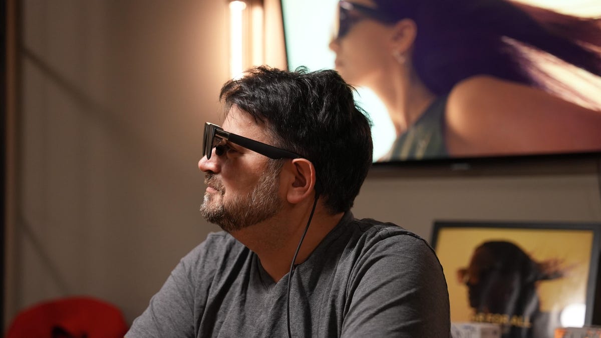 CNET's Scott Stein wearing Xreal One glasses in a demo