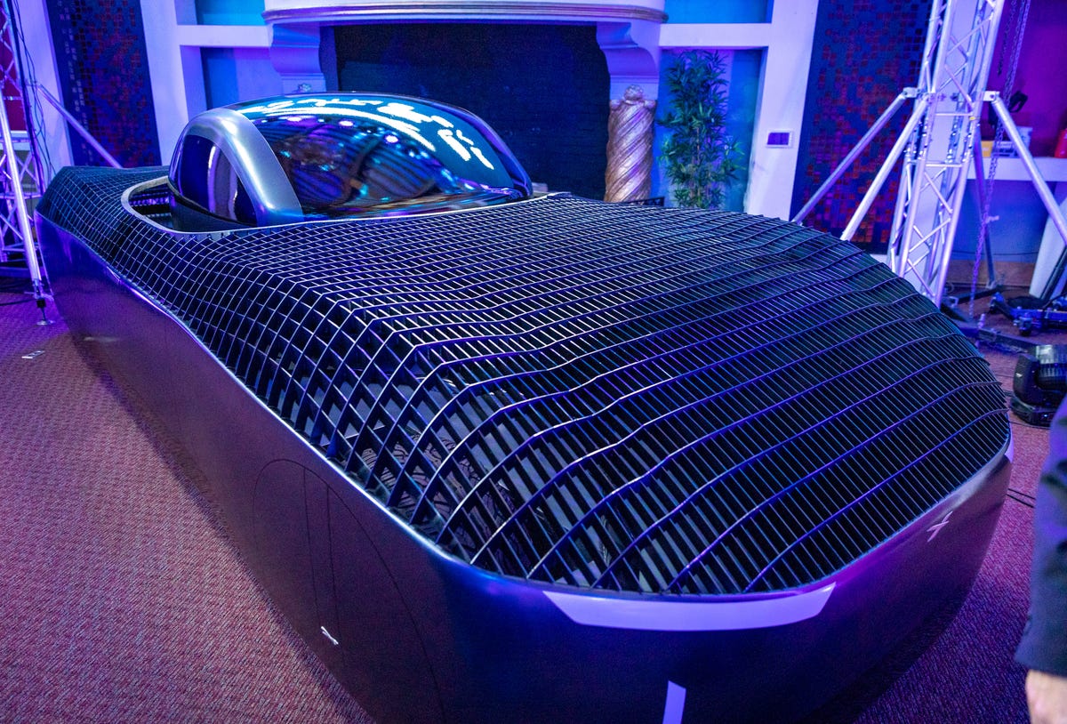 An Alef Model A flying car prototype shows a mesh-topped body to let air through to its propellers