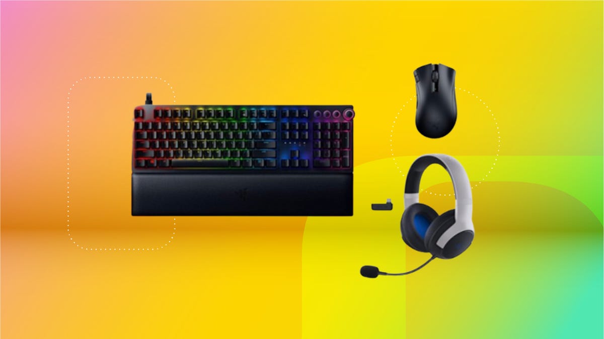 Black Razer keyboard, wireless mouse and headset against coral, yellow and mint green CNET background.