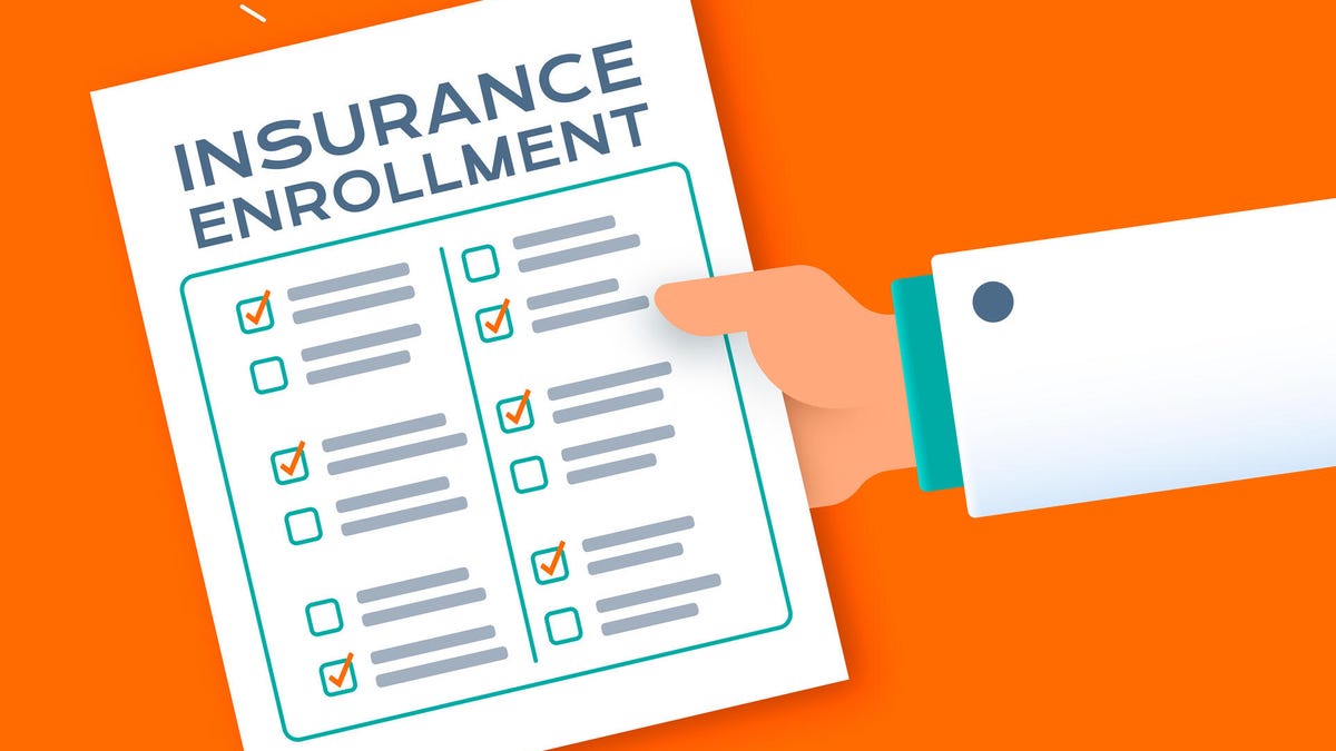 A red heart-shaped stethoscope on a teal background.