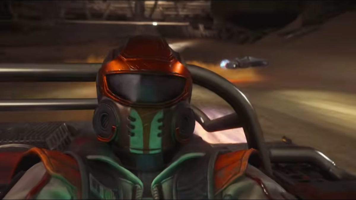 a screenshot of a closeup of a podracer in his pod during a race