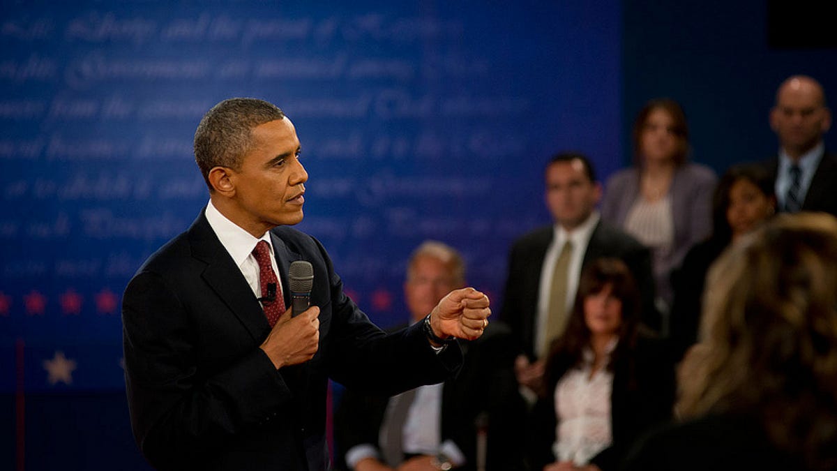 Barack Obama, who was reelected last night, at a debate last month.