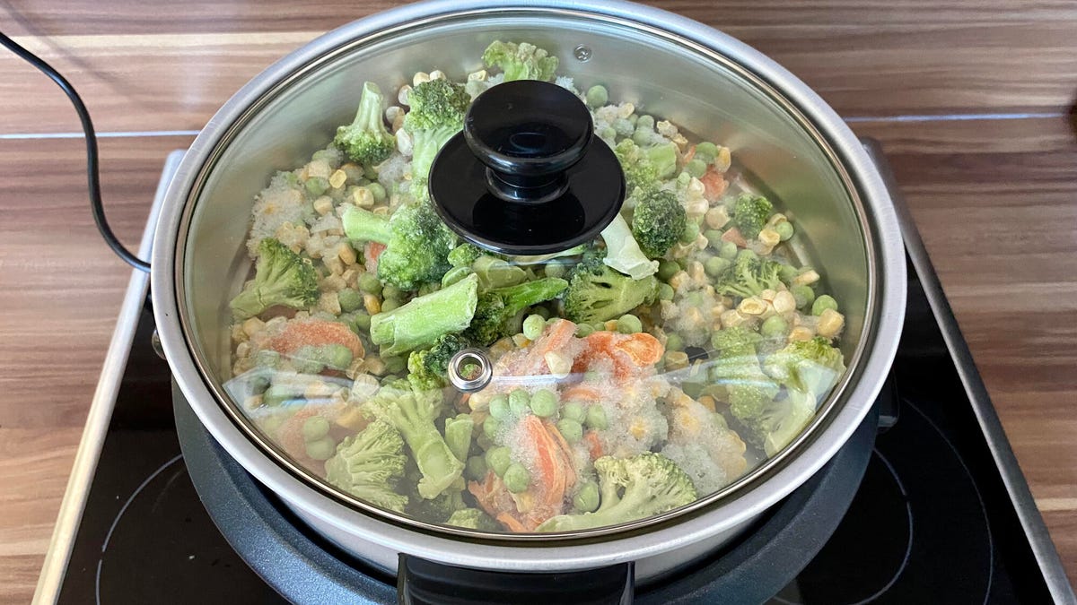 A rice cooker full of veggies