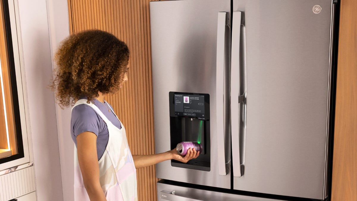 person scanning jar on Ge profile fridge