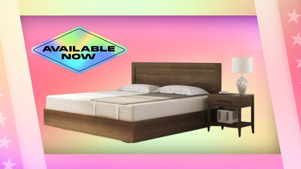 Cooling system on bed on wooden bed frame. Right: nightstand with lamp. Background: green and pink gradient. Foreground: top left, diamond stick with black text that reads "available now."