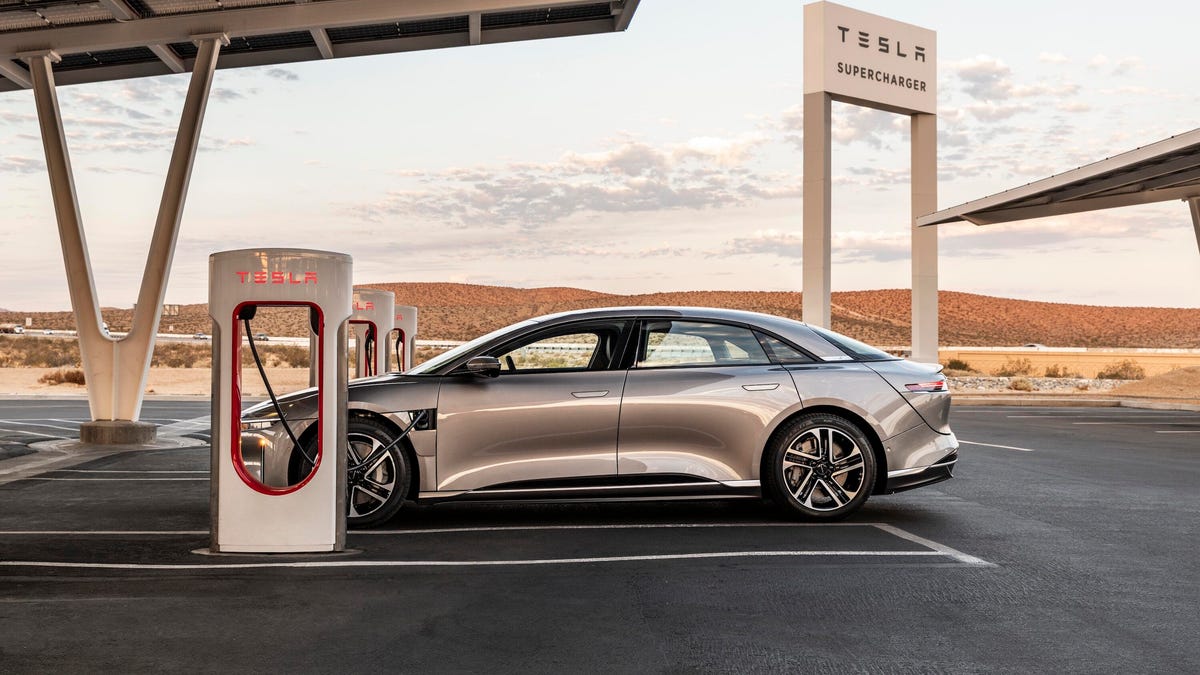 2026 Lucid Air charging at Tesla Supercharger station