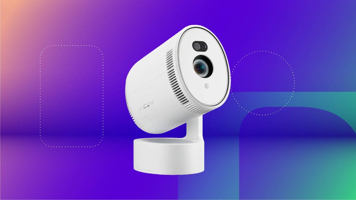 A white LG projector against a purple gradient CNET background.