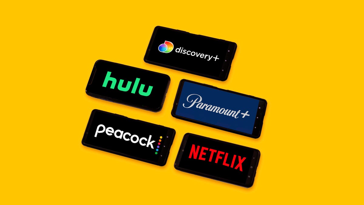 Discovery Plus, Hulu, Paramount Plus, Peacock, and Netflix streaming service apps on phones.