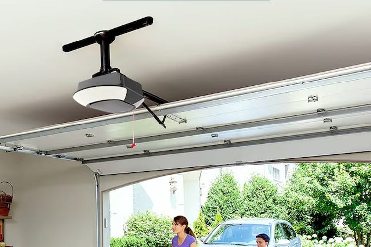 A MyQ smart garage motor in a white garage.