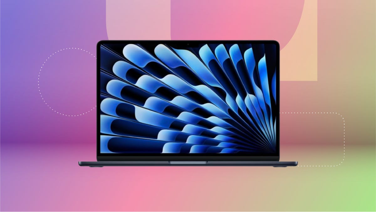 Black M5 MacBook Air in black against purple, pink and green CNET background.