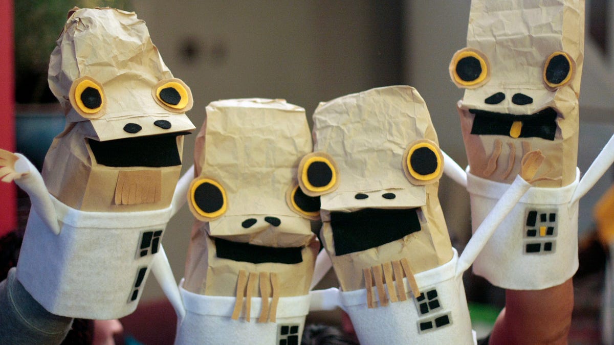 Sticking out his tongue