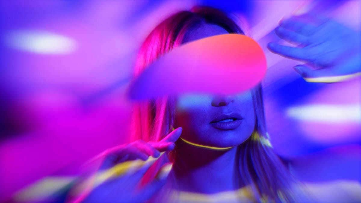 A woman wearing a virtual reality headset.