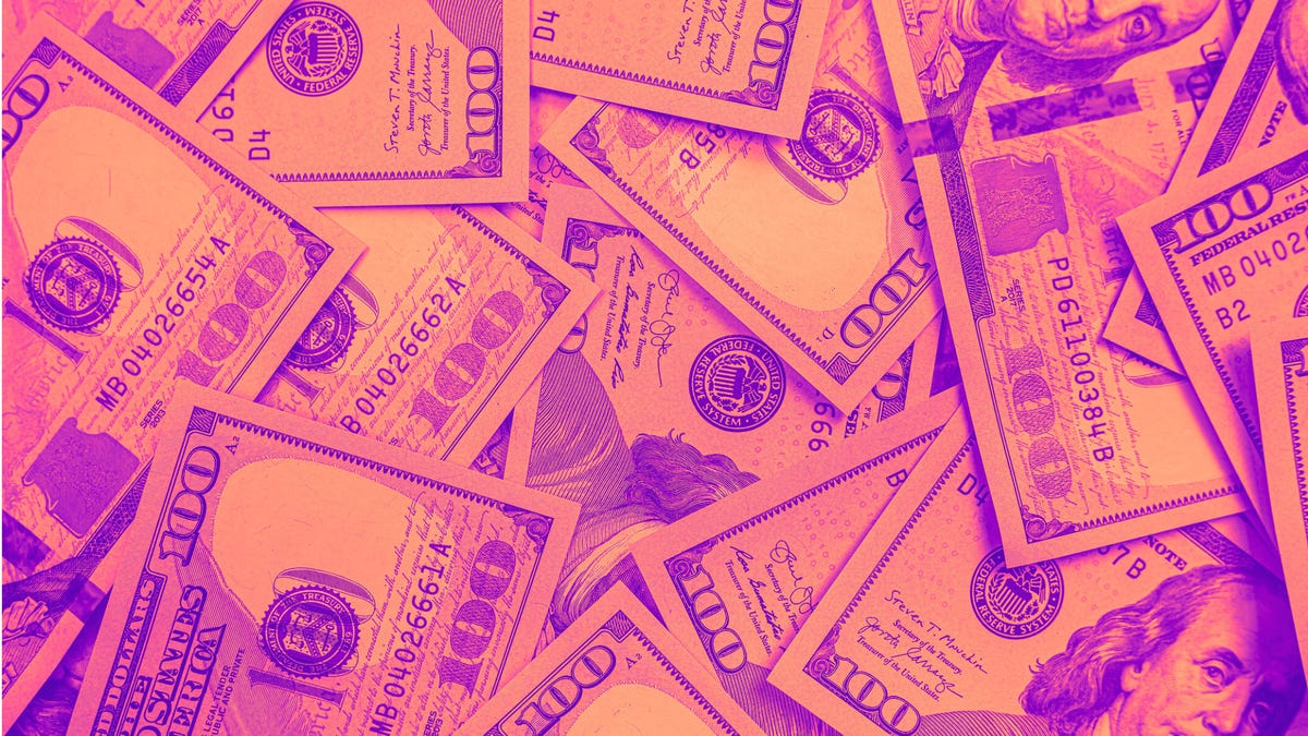 one hundred dollar bills with a purple and amber overlay