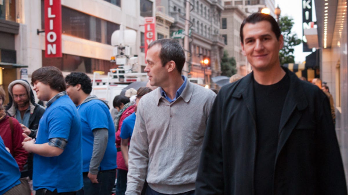 John Browett (left), the new retail chief at Apple, and Steve Cano, Apple's manager of retail stores, survey the launch day iPad line in San Francisco last month.