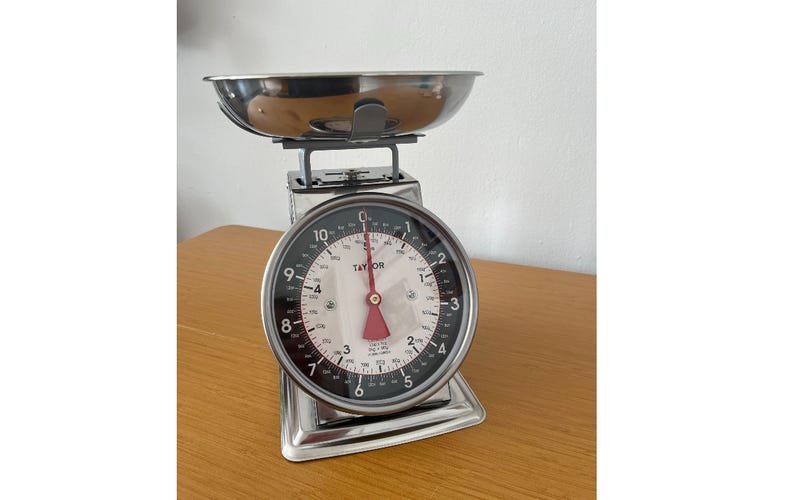 mechanical scale on a wooden table