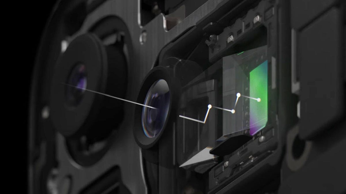 An illustration of light traveling through the iPhone 15 Pro Max's tetraprism