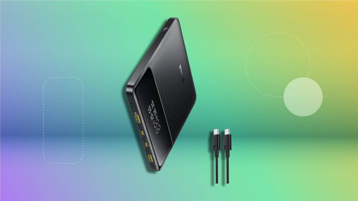 A Baseus portable charger on a bright background.