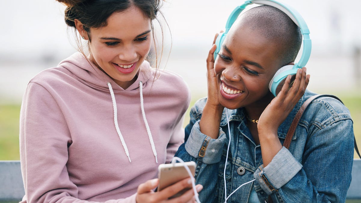 listening-to-music-gettyimages-1702245564