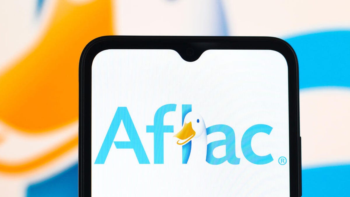an image of the Aflac duck and logo on a phone screen in front of a bigge image of the logo.