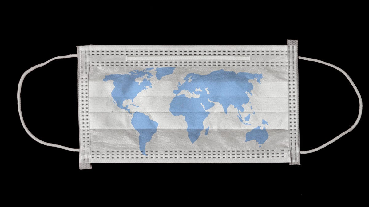 Face mask with map of the world printed on it