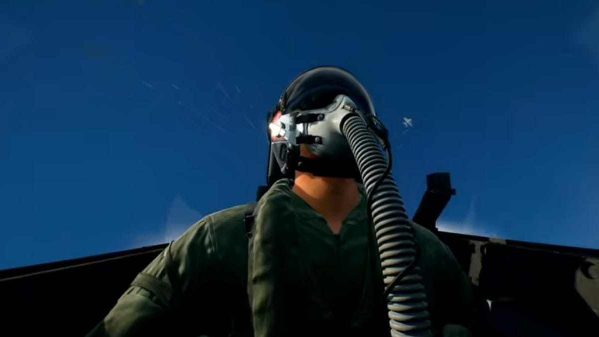 a screenshot of a fighter pilot in a jet looking up