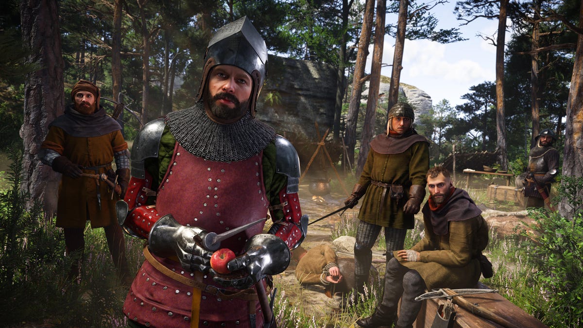 A group of armed men, likely bandits, stare at the player character.