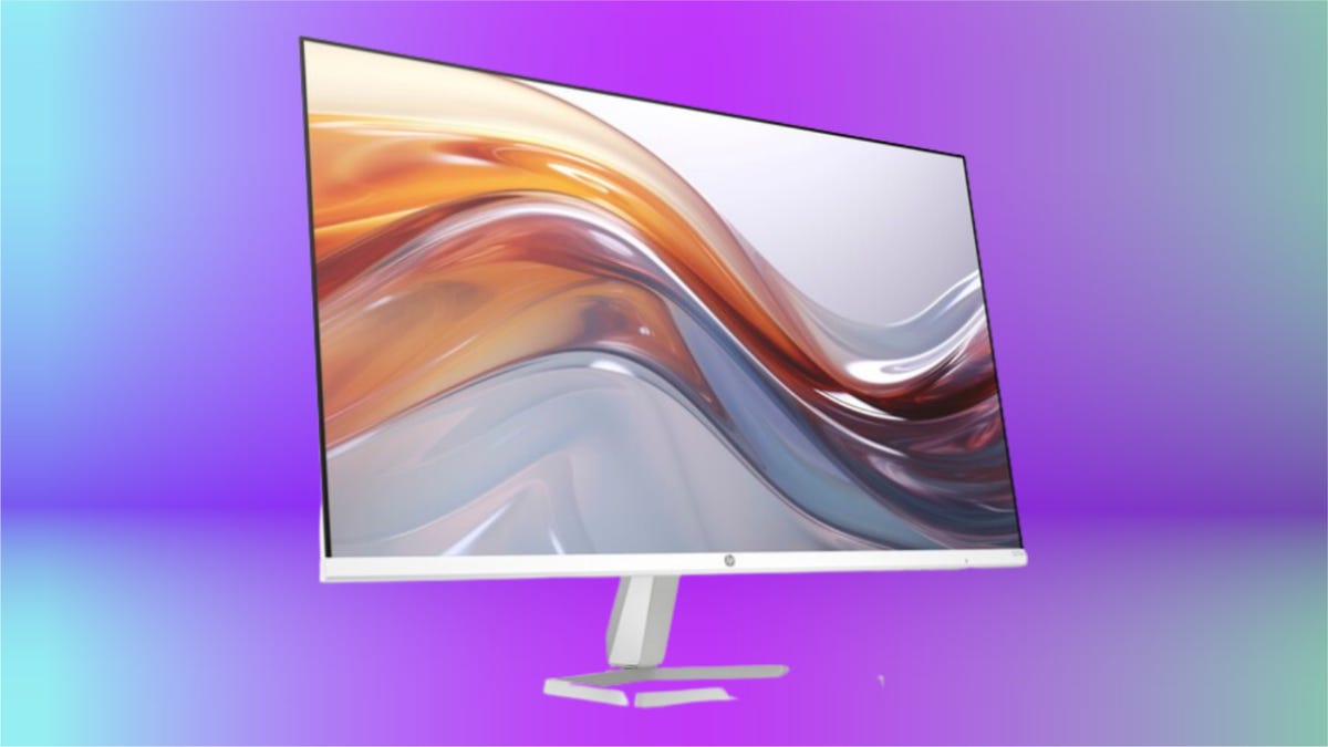 Large monitor with swirling display in shades of grey, ochre, and clay shown against a vivid purple background with gradient turquoise edging