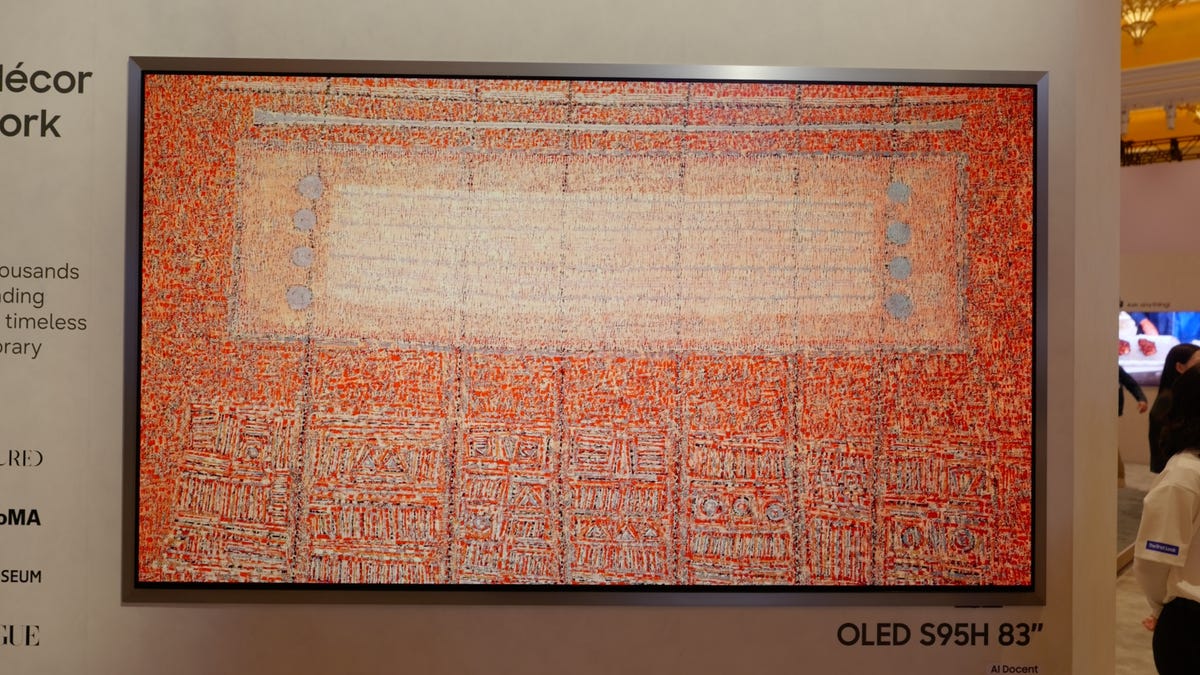 Samsung S95H on a wall displaying artwork