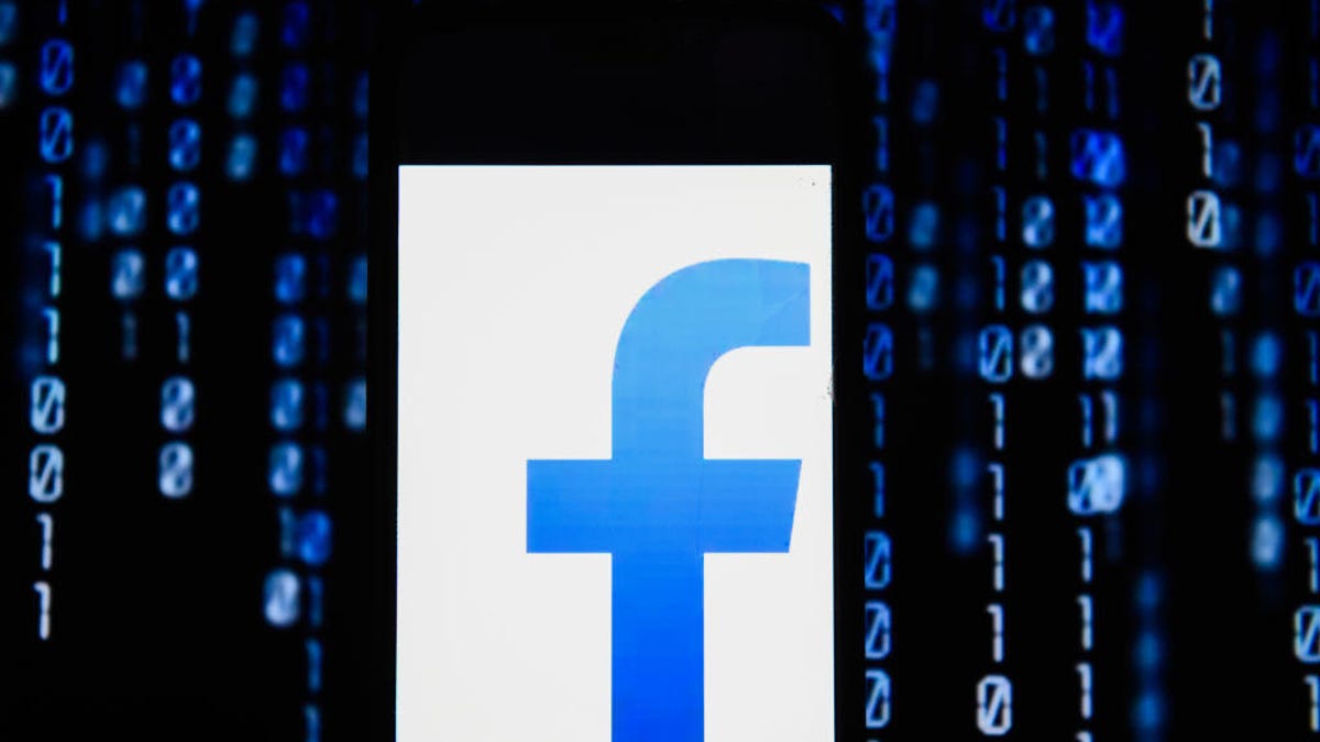Facebook logo is seen on an android mobile phone