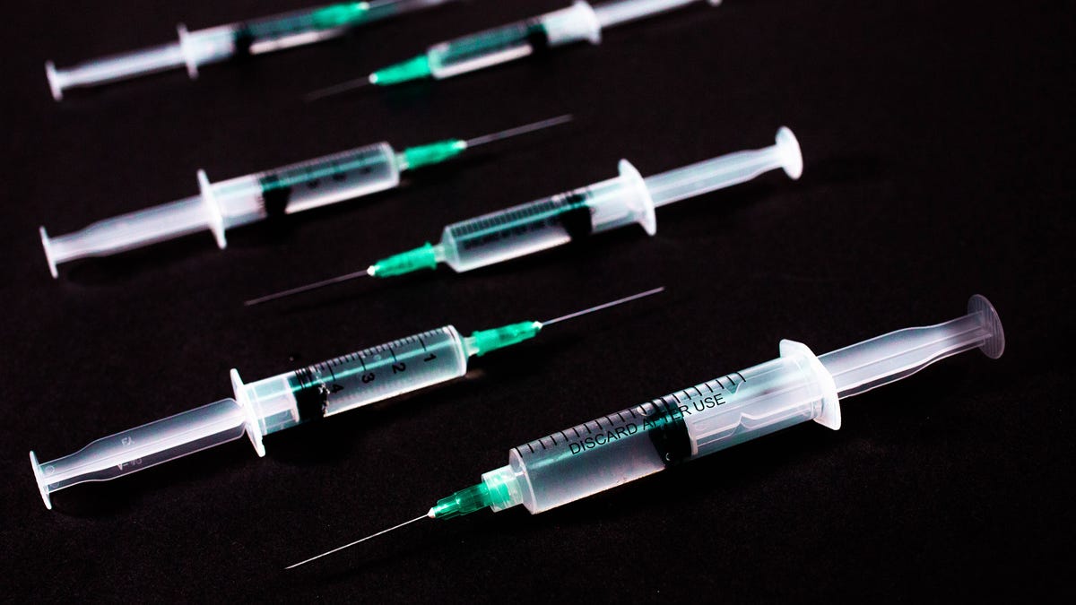 covid-19-vaccines-regular-endless-booster-shots-syringes-winter-2021-cnet-103